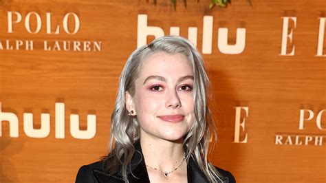 Phoebe Bridgers poses semi